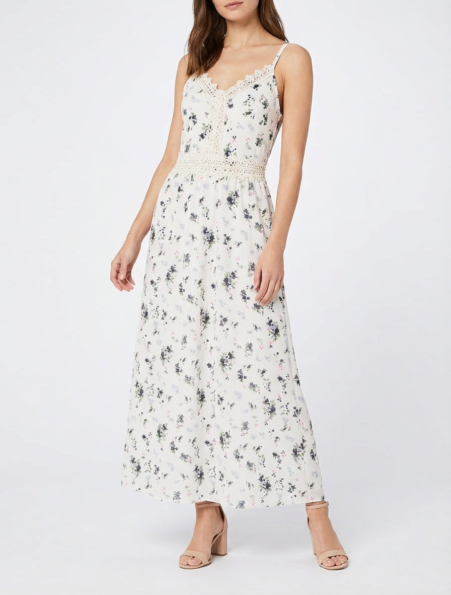 Lange jurk met kleine bloemenprint en haakdetails. - Zwart