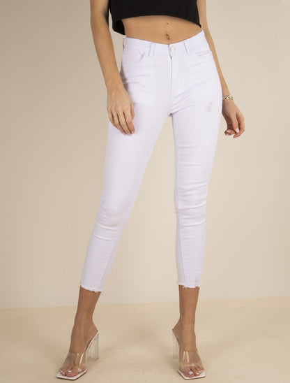 Jean 7/8 met slijtagedetails en rafelige randen - wit