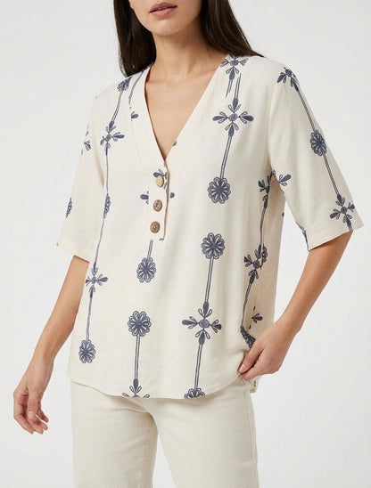 Ruimvallend top met korte mouwen en bloemenprint - Beige