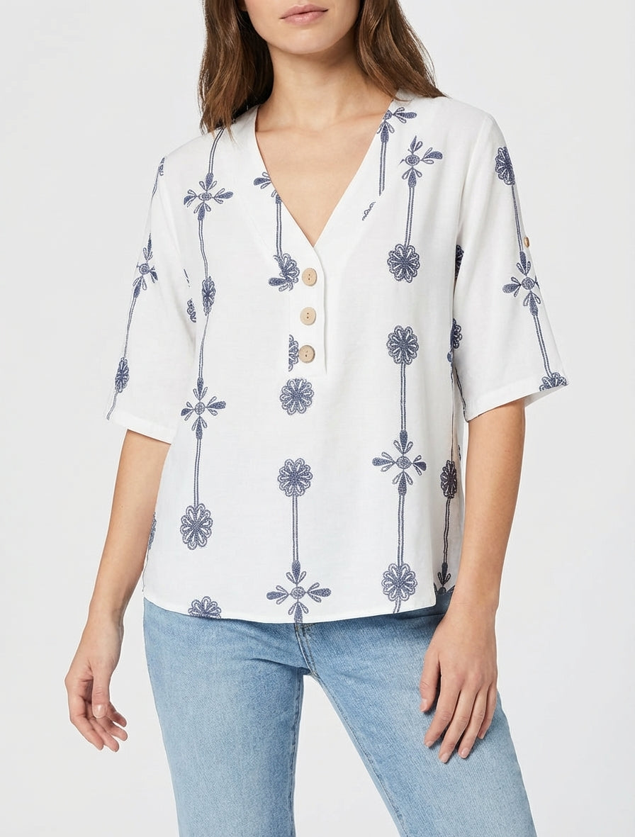 Ruimvallend top met korte mouwen en bloemenprint - Wit