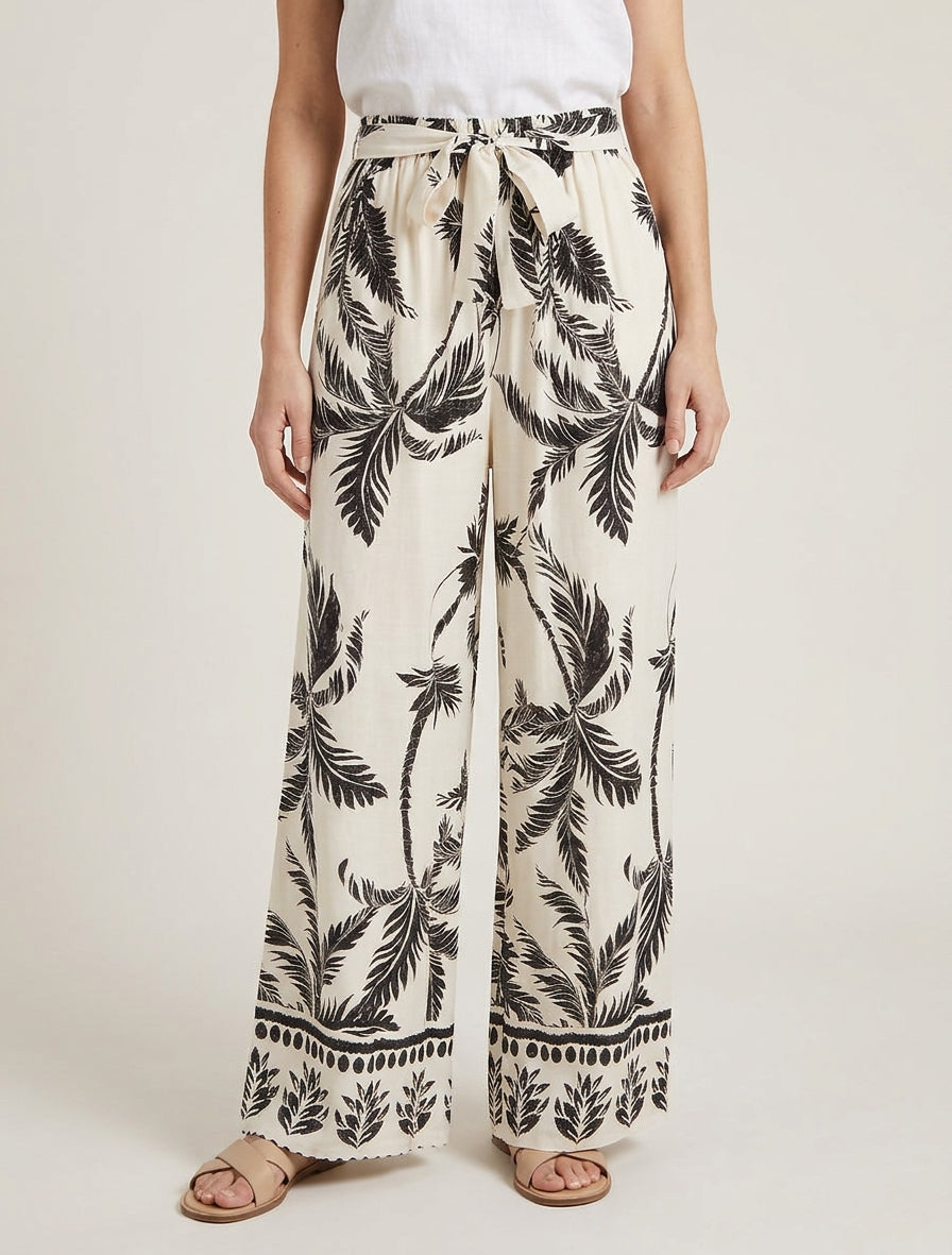 Elastische vloeiende broek met bladerprint - Beige