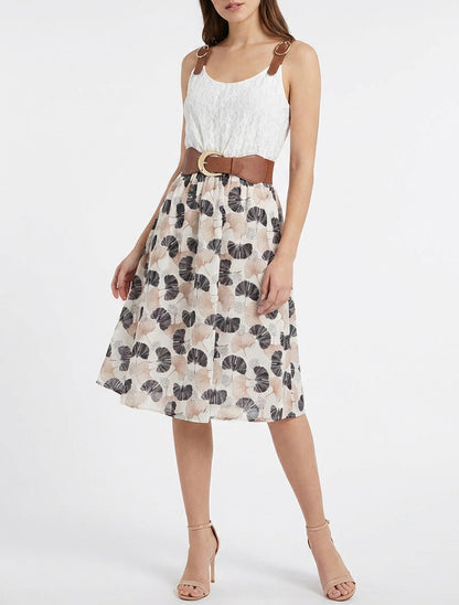 Midi-jurk met ginkgo-print en imitatiebandjes. - Zwart